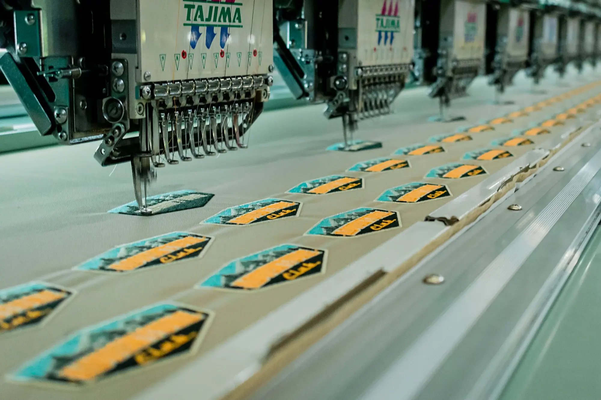 Tajima embroidery machines at World Emblem facility